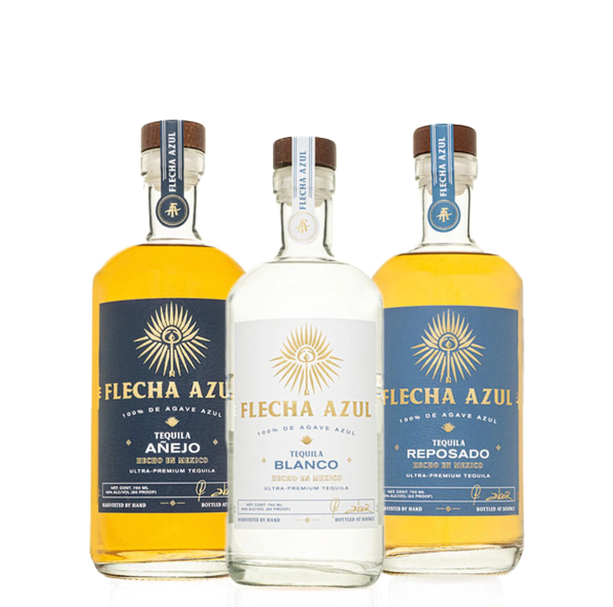 Team enjoying a guided tequila tasting featuring Flecha Azul bottles, with tasting glasses and fresh garnish on a sleek event setup.